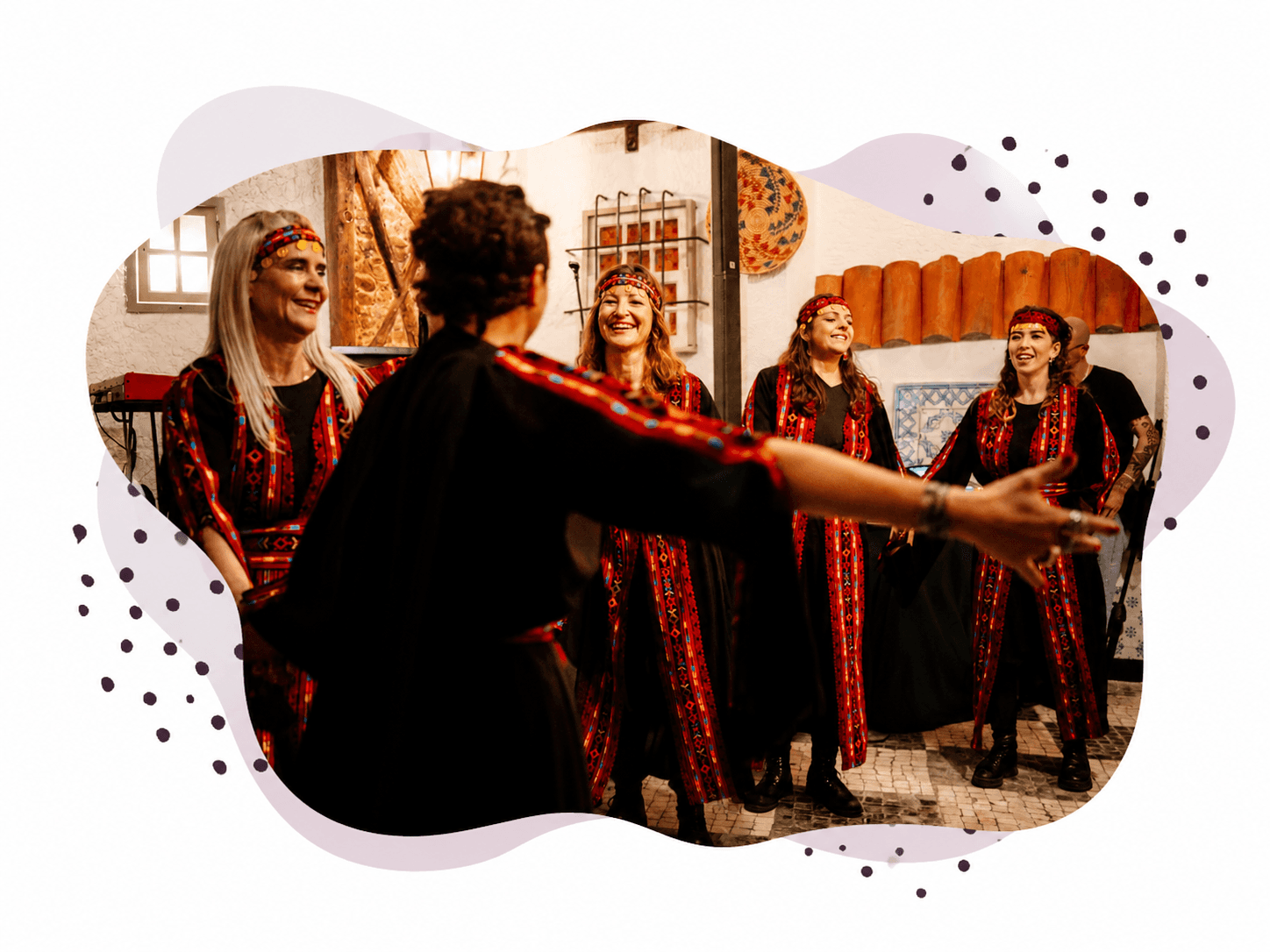 An illustration of the café-and-stage room of Palestine House, warm and full of life.
